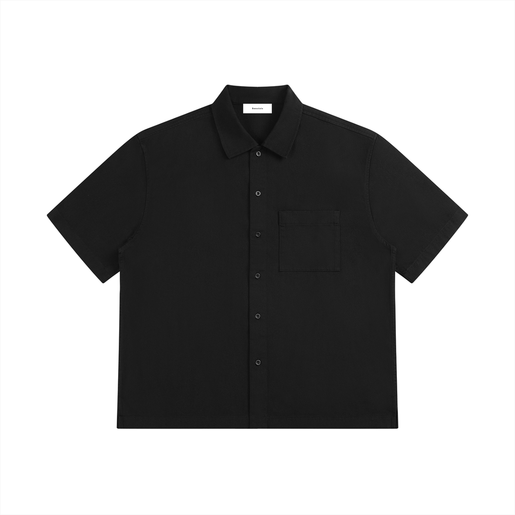 Black short-sleeve shirt with a small pocket on a white background
